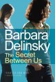 Secret between us, The. Cover Image
