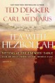 Tea with Hezbollah sitting at the enemies' table : our journey through the Middle East  Cover Image